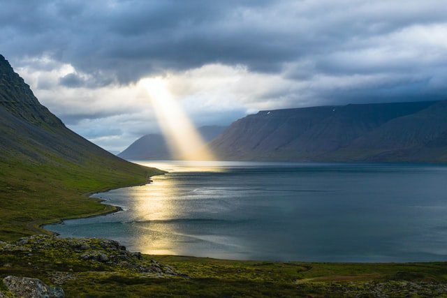 Sun shining on lake